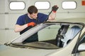 Windshield windscreen replacement works Royalty Free Stock Photo