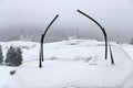 Windshield wipers of cars covered in snow after a Blizzard