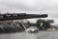 Windshield wipers from inside of car, season rain Royalty Free Stock Photo