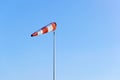 Windsock against blue sky Royalty Free Stock Photo