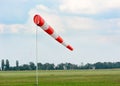 Windsock against cloudy sky. Royalty Free Stock Photo