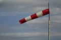 Windsock blown by the wind on the field Royalty Free Stock Photo