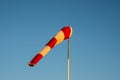 Windsock on blue sky background Royalty Free Stock Photo