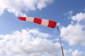 Windsock flag with red and white stripes