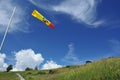 Windsock and mountain meadow Royalty Free Stock Photo