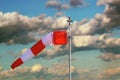 Windsock over stormy sky