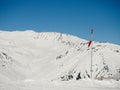 Windsock in winter Alps Royalty Free Stock Photo