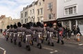 Marching military band members on the High Street in Windsor, UK Royalty Free Stock Photo