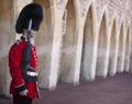 WINDSOR, ENGLAND - AUGUST 26, 2019: Changing Guard takes place in Windsor Castle. British Guards in red uniforms are among the Royalty Free Stock Photo