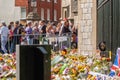 WINDSOR, ENGLAND- 11 September 2022: Mourners at Windsor Castle with flowers following`s death
