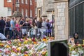 WINDSOR, ENGLAND- 11 September 2022: Mourners at Windsor Castle with flowers following`s death