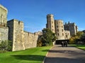 Windsor / Great Britain - November 02 2016: Walls, buildings and towers of the Windsor Castle on a sunny day