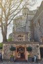 Souvenir shop behind Edward III Tower, Windsor Castle, a royal residence palace and major tourist attraction at Windsor, UK Royalty Free Stock Photo