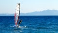 Windsurfer in background of mountains in the distance. summer Sunny day. Greece, Rhodes