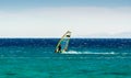 Windsurfer on the background of mountains rides on the waves of the Red Sea in Egypt Dahab South Sinai Royalty Free Stock Photo