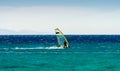 Windsurfer on the background of mountains rides on the waves of the Red Sea in Egypt Dahab South Sinai Royalty Free Stock Photo