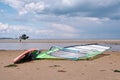 Windsurfer board with kitesurfing in the background