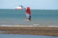 Windsurfer with ferry in the background Royalty Free Stock Photo