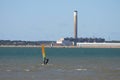 Windsurfer in front of dismantled Fawley power station Royalty Free Stock Photo