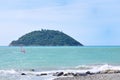 Windsurfer in front of Gallinara island, Alassio Royalty Free Stock Photo