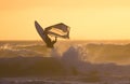 Windsurfer jump sunset