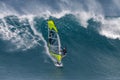 Windsurfer and large wave, Maui, Hawaii Royalty Free Stock Photo