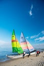 Windsurfer or man sportsman surfs and sails on board Royalty Free Stock Photo