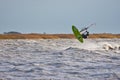 Windsurfing jump on a lake Royalty Free Stock Photo