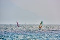 Windsurfer pro-rider surfing at high speed on Lake Garda, italy