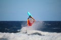 Windsurfer during a jump called backloop in the waves of the Atlantic Ocean, Tenerife, Spain Royalty Free Stock Photo