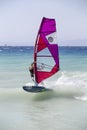 Windsurfer riding on wave Royalty Free Stock Photo