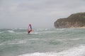 Windsurfer on the rough, stormy sea of the Skagerrak Royalty Free Stock Photo