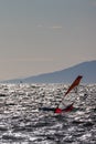 Windsurfer silhouette in Thracian sea at winter Royalty Free Stock Photo