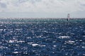 Windsurfer surrounded with sea