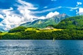 Windsurfers in the lake with mountains, Alpnachstadt, Alpnach Obwalden Switzerland