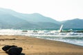 Windsurfers in the sea on Crete on sunset. Windsurfing in Heraklion. Greece