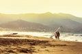 Windsurfers in the sea on Crete on sunset. Windsurfing in Heraklion. Greece