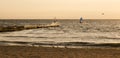 Windsurfers on the sea during the sunrise Royalty Free Stock Photo