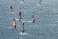 Windsurfers on the sparkling waves of the Mediterranean sea