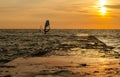 Windsurfers on the sunrise Royalty Free Stock Photo