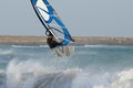 Windsurfing in big waves Royalty Free Stock Photo