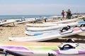 Windsurfing board with sail lying on the sand Royalty Free Stock Photo
