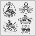 Windsurfing emblem and label.Set of different surfboards. Vector illustration. Surfing emblems, icons and labels.Set of surfing em