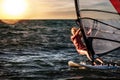 Windsurfing, Fun in the ocean, Extreme Sport. Woman lifestyle Royalty Free Stock Photo