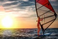 Windsurfing, Fun in the ocean, Extreme Sport. Woman lifestyle Royalty Free Stock Photo