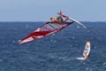 Windsurfer and large wave, Maui, Hawaii Royalty Free Stock Photo