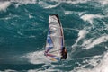 Windsurfer and large wave, Maui, Hawaii Royalty Free Stock Photo