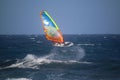 Windsurfer jumping in the waves of the Atlantic ocean Royalty Free Stock Photo