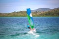 Windsurfing in the warm emerald green Caribbean water Trois-Ilets, Martinique