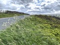 Windswept moorland, with dry stone walls, and cloudy weather near, Oxenhope, Yorkshire, UK